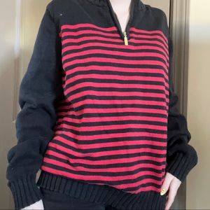 Black quarter-zip sweater with red stripes